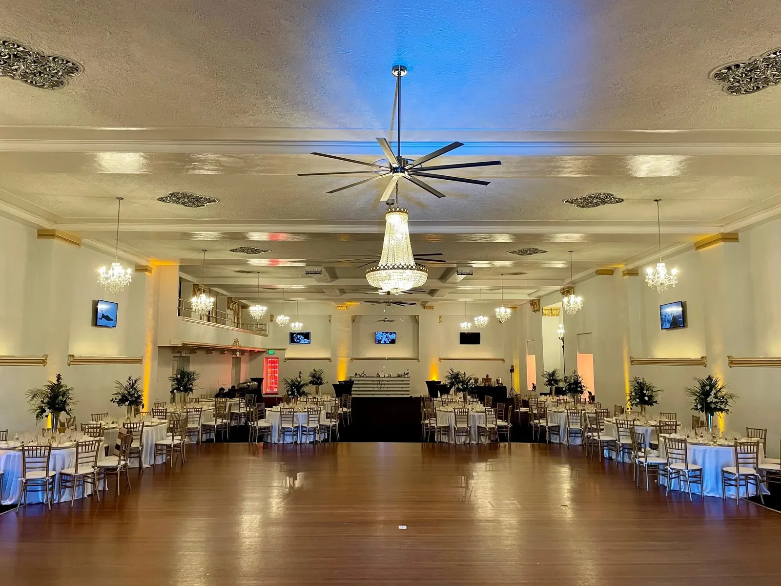 Downtown Compound, the Hollywood Ballroom under blue uplighting