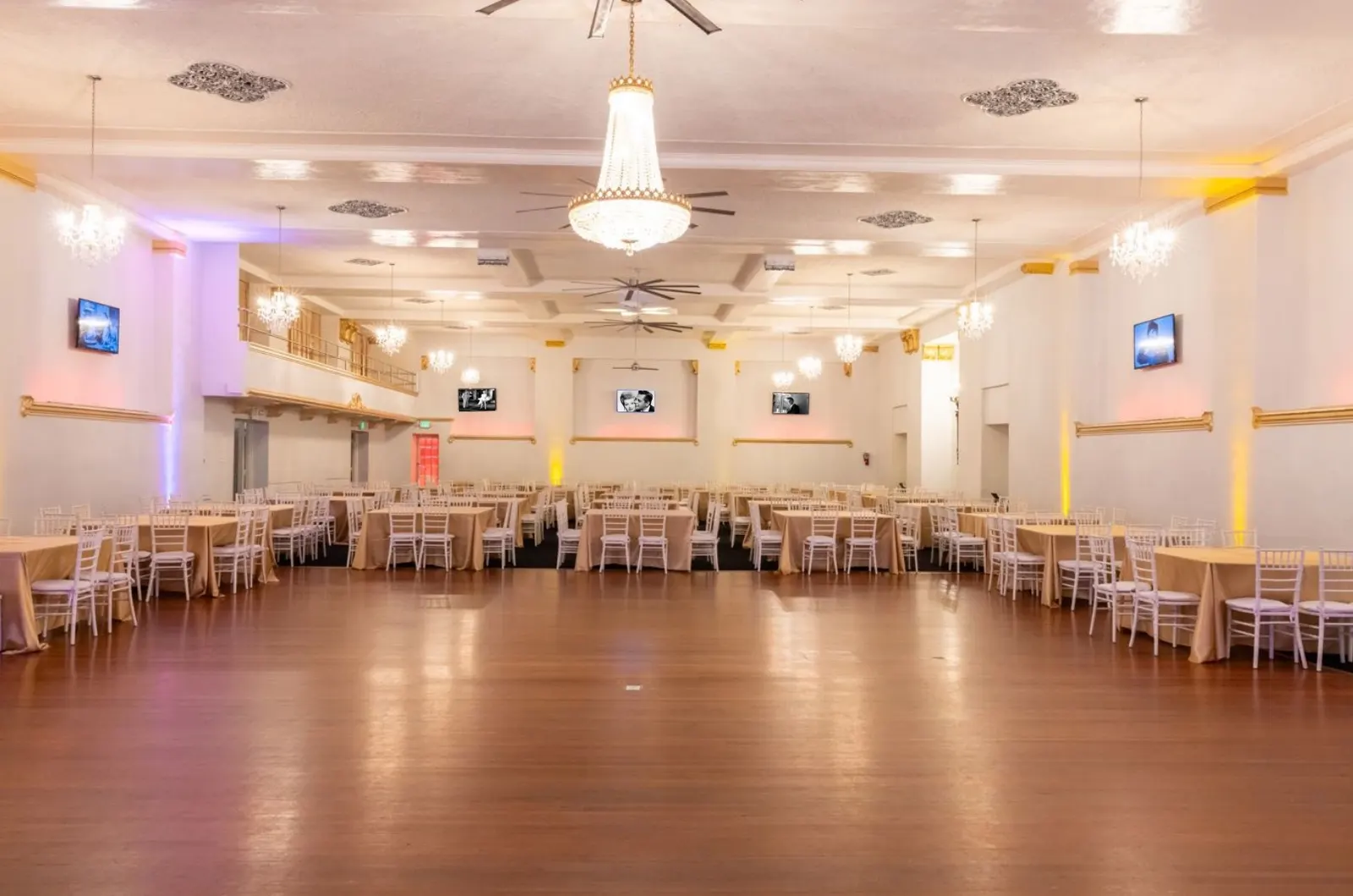 Hollywood Ballroom, chandelier and pink uplighting