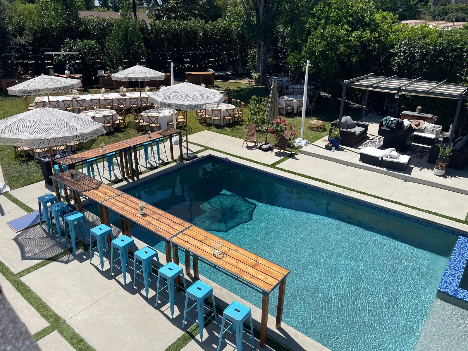 North Hills House, the pool with its swim-up bar and umbrellas from above